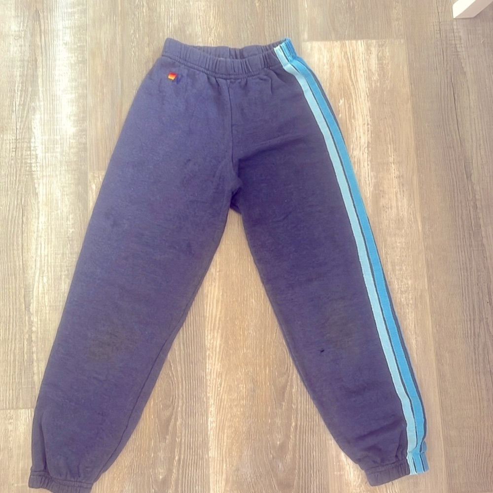 Have been worn a couple times. Navy blue with different shades of blue strips!